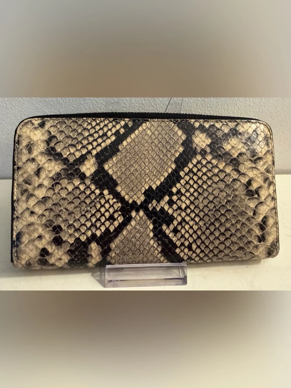 Tory Burch zip around continental wallet with snakeskin.